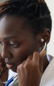 Female doctor with stethoscope listening to inner critic